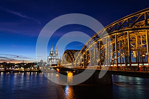 Cologne skyline with Cologne Cathedral and Hohenzollern bridge at night