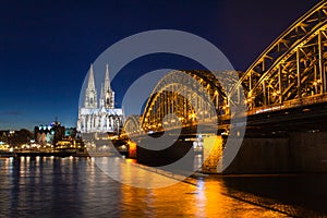 Cologne skyline with Cologne Cathedral and Hohenzollern bridge at night