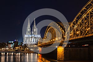 Cologne skyline with Cologne Cathedral and Hohenzollern bridge at night