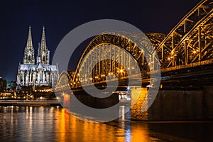 Cologne skyline with Cologne Cathedral and Hohenzollern bridge at night