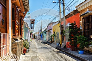 Scenic colorful streets of Cartagena in historic Getsemani district photo