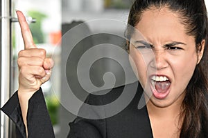 Colombian Business Woman And Anger Wearing Suit