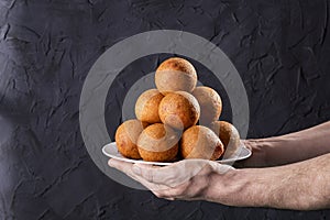 Colombian buÃÂ±uelos, cheese balls and corn flour photo