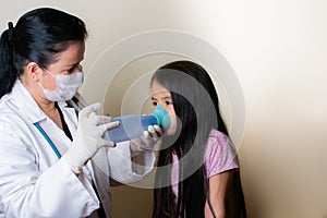 Colombian girl is examined by her pediatrician in the consulting room