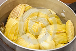 Colombian Sweet Corn Wrap Preparation photo