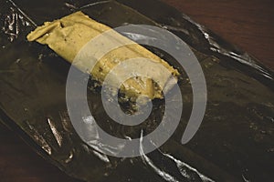 Colombian tamale recipe with steamed banana leaves photo