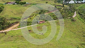 Colombian typical chiva bus in rural roads Drone - 4k