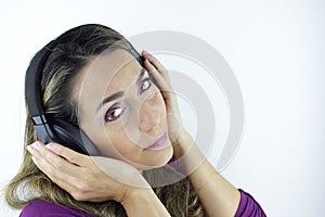 Colombian woman listening to music