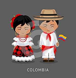 Colombians in national dress with a flag. photo