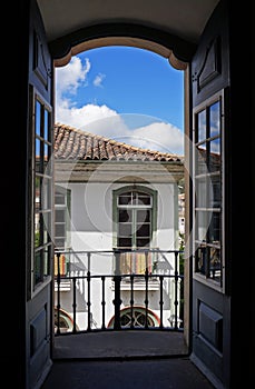 Colonial balcony door with view of Ouro Preto, Brazil