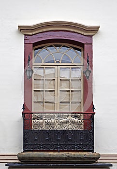 Colonial balcony on facade in Sao Joao del Rei, Brazil