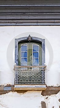 Colonial balcony on facade in Serro, Minas Gerais, Brazil photo