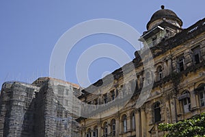 Colonial building and a modern building