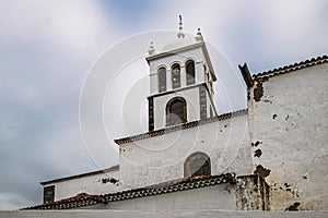 Colonial church against an overcast sky in Garachico photo