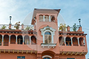 Colonial house balcony with flowers and plants