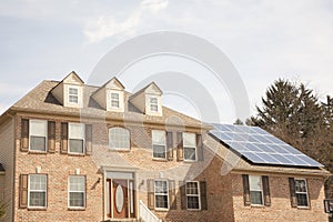 Colonial house with solar panel