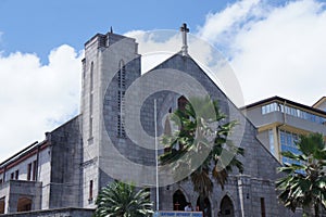 A colonial-style church building in the center of the Fijian capital city of Suva on the island of Viti Levu photo