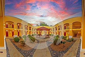 Colonial style courtyard at sunset