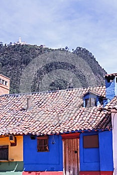 Colonial style houses. La Candelaria, Bogota. Blue house in the spanish colonial neighborhood of La Candelaria, Bogota, Colombia