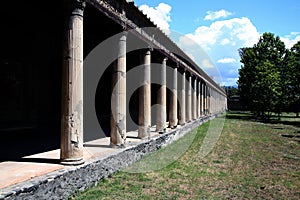 Colonnade of the Great Palestra in the green, Pompeii, Campania, Italy photo