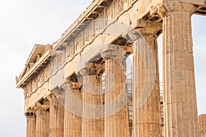 Colonnade with marble ancient columns of Parthenon temple on the Acropolis in Athens, Greece. Popular travel destination