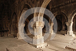 Colonnade of medieval monastery photo