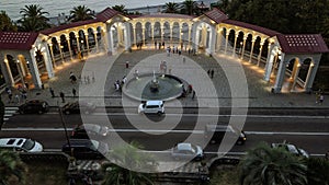 The colonnade symbol of the city of Gagra at evening illumination.
