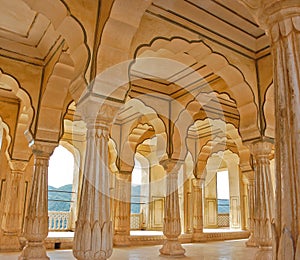 Colonnades in Amber fort, India photo