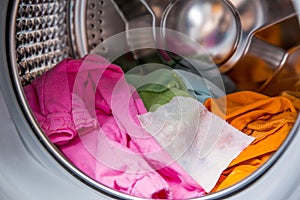 Color absorbing sheet inside a washing machine.