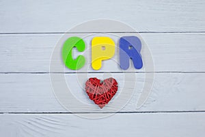 Color alphabet in word CPR abbreviation of Cardiopulmonary resuscitation on white wood background