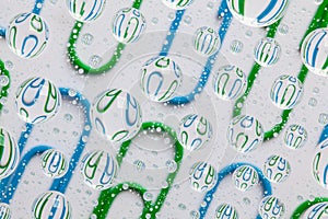 Color background with water drops and paper clips