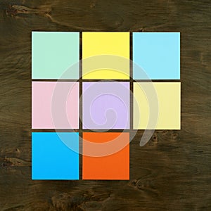 Color bar from paper sticker on wood background in square frame form . Flat design and top view of interface menu concept on desk.