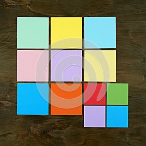 Color bar from paper sticker on wood background in square frame form . Flat design and top view of interface menu concept on desk.