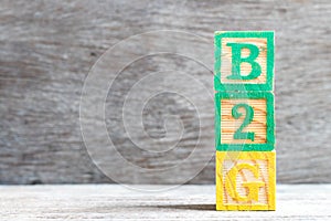 Color block in word b2g abbreviation of business to government on wood background