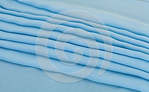 Color blue textil, silk fabric with pleats