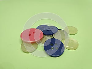 color buttons for clothes isolated on yellow background