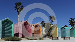 Color cabins at La Mer sand beach in Dubai, United Arab Emirates