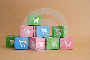 Color carton boxes with drawing print of trolley or shopping cart. Ecommerce, online shopping, COD Cash On Delivery