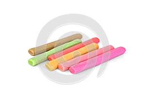 Color chewable candy sticks isolated on a white background.