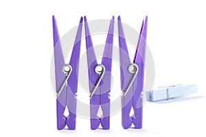 Color clothes-peg isolated on white background