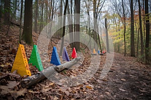 color-coded trail markers with corresponding color representing each unique marker, leading the way