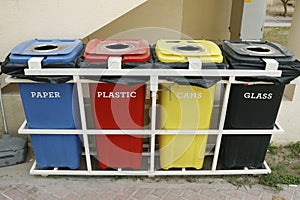 Color coded trash bins for waste segregation photo