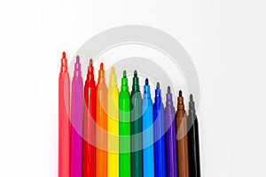 Color colored markers isolated on white background close up. Drawing colored felt pen