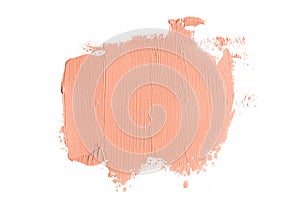 Color corrector brush strokes isolated on white background. Peach pink color correcting concealer smudge photo