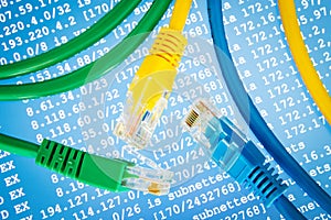 Color Ethernet cables with routing table on the blue background