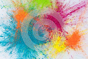 Color explosion concept with holi powder closeup