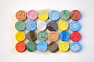 Color extasy pills of various designs used by MDMA dealer photo