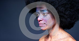 Color face paint makeup, black woman portrait and unique, creative art and fantasy cosmetics on dark studio background