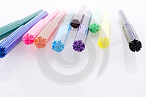 Color felt-tip pens on white background