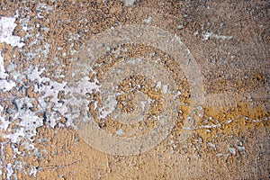 Color of flaked white and yellow ocher brown on old vintage interesting wall in the doorway creates an abstract pattern